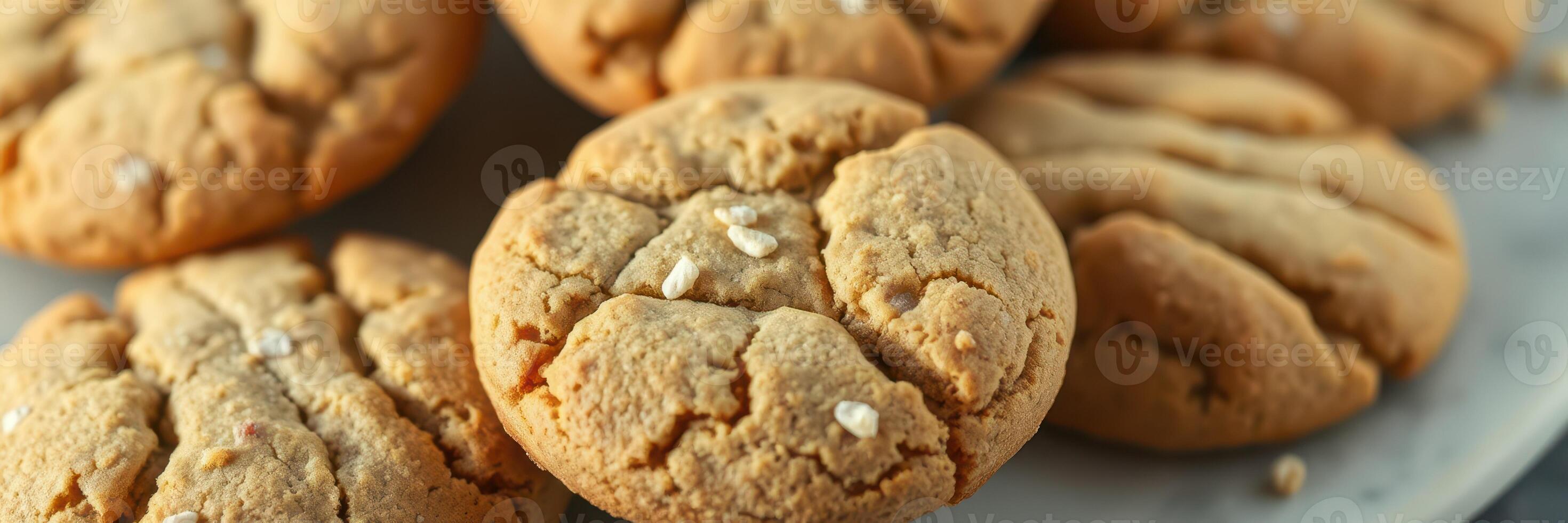 Freshly baked oatmeal cookies arranged on a plate with a warm and inviting appearance photo
