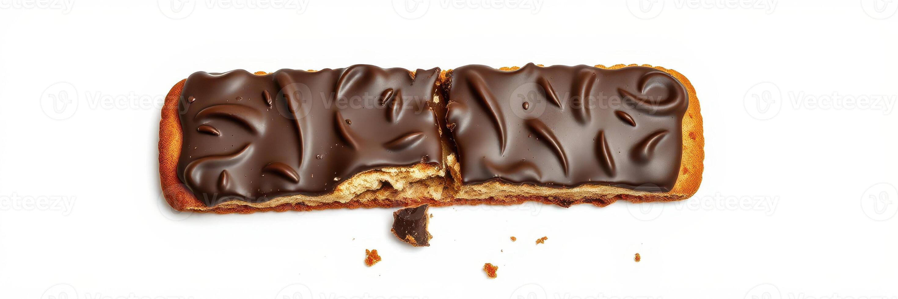 Delicious chocolate-covered biscuit split in half revealing creamy filling and crispy texture photo