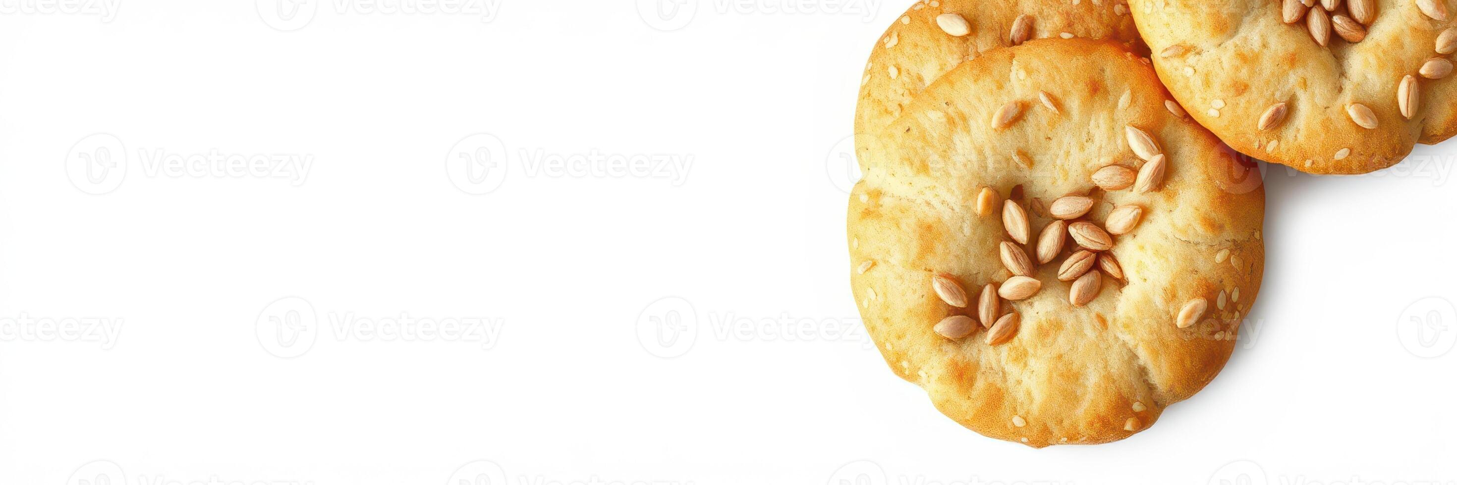 Homemade sesame cookies on a white background with a focus on texture and appearance photo