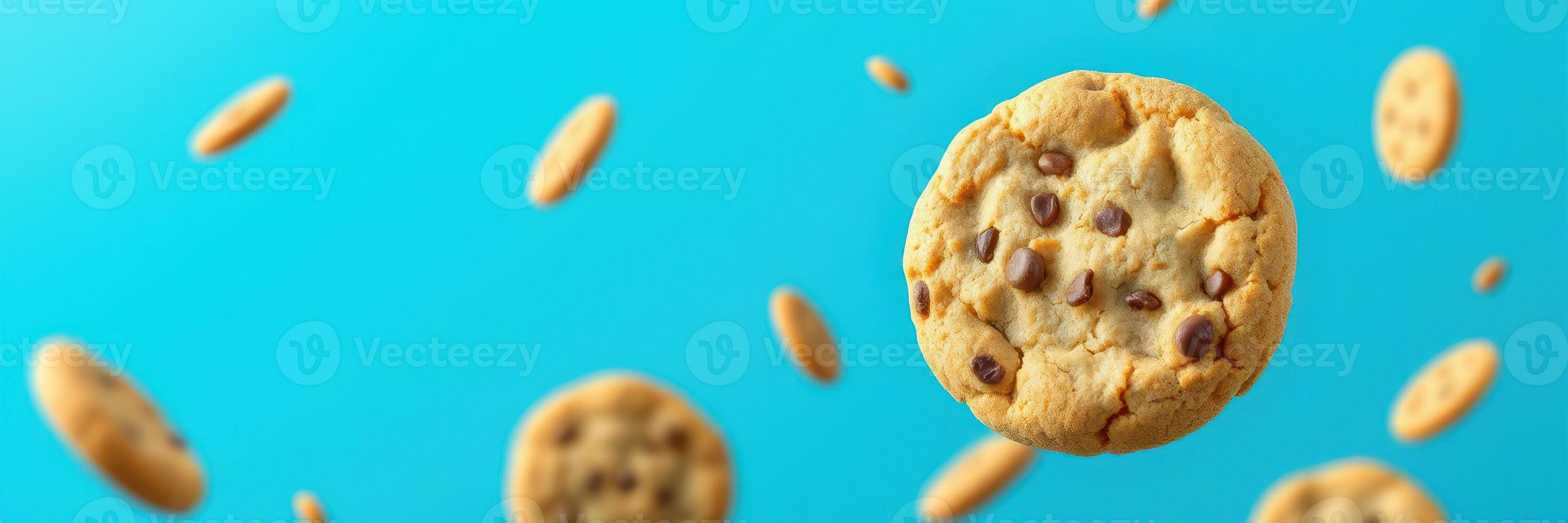 Cookies floating in the air against a blue background create a fun and whimsical atmosphere that tempts anyone nearby photo