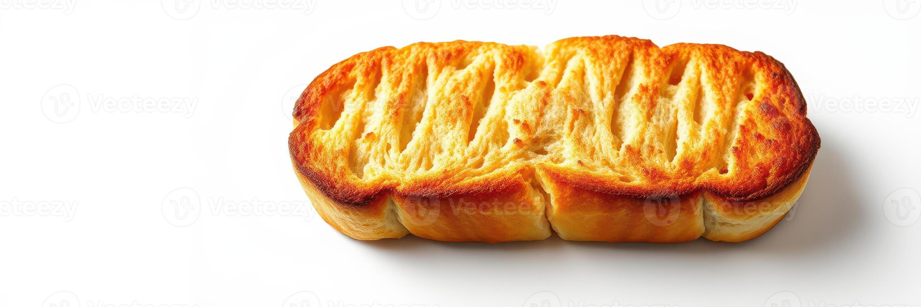 Soft golden bread loaf fresh out of the oven with a fluffy texture and crispy crust photo