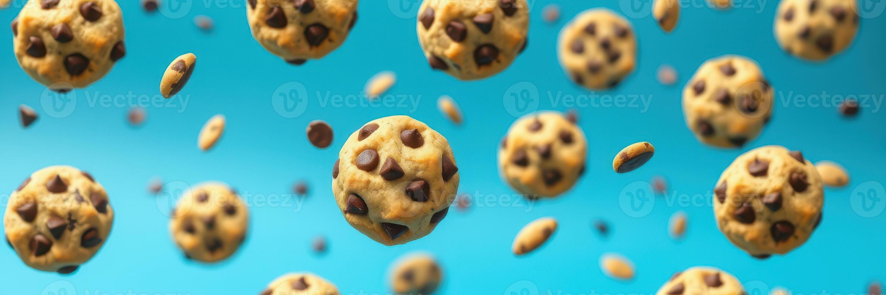 Chocolate chip cookies floating in mid-air against a vibrant blue background creates a whimsical atmosphere photo