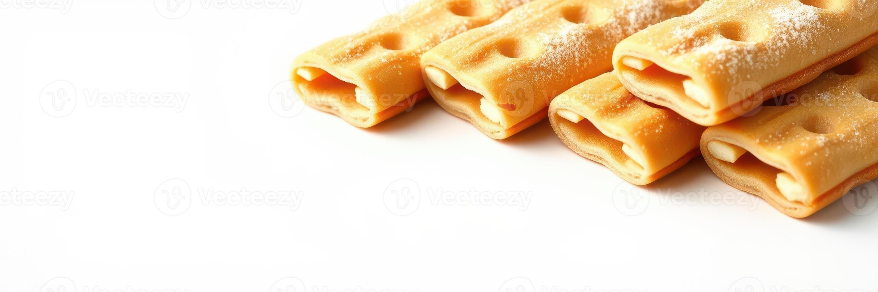 Delicious rolled pastries dusted with sugar ready for enjoyment at a pastry shop photo
