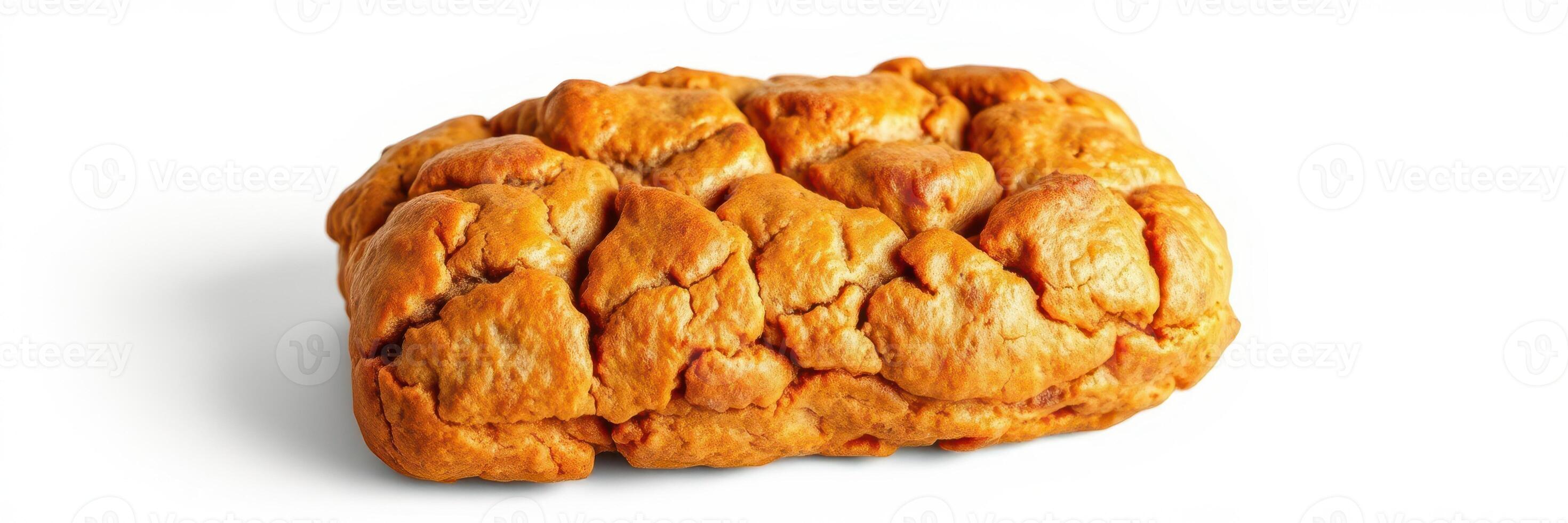 Freshly baked bread loaf with a golden crust on a white background showcasing its unique texture and shape photo
