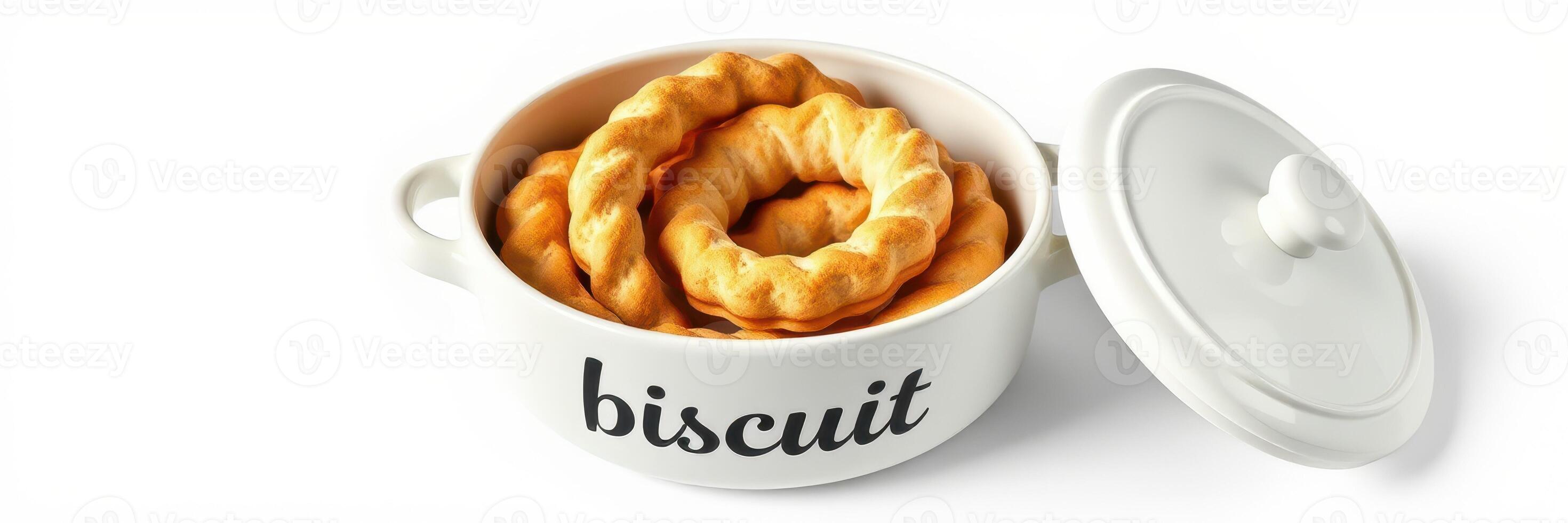 Delicious homemade biscuits served in a stylish white dish with a lid on an elegant kitchen countertop photo