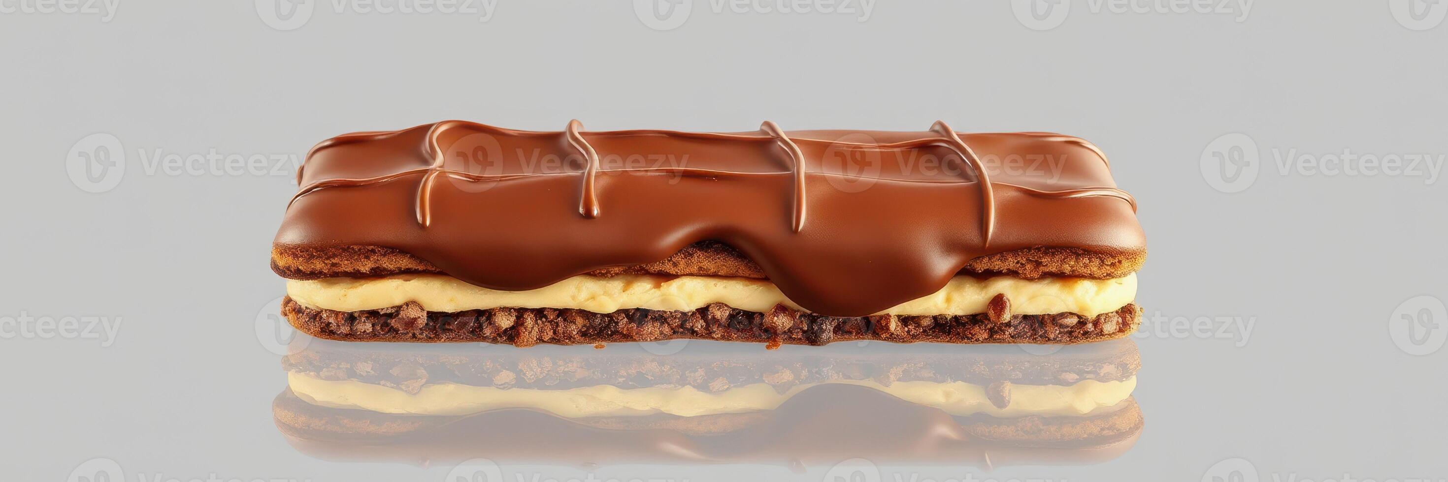 Delicious chocolate and cream dessert with a glossy finish on a reflective surface photo