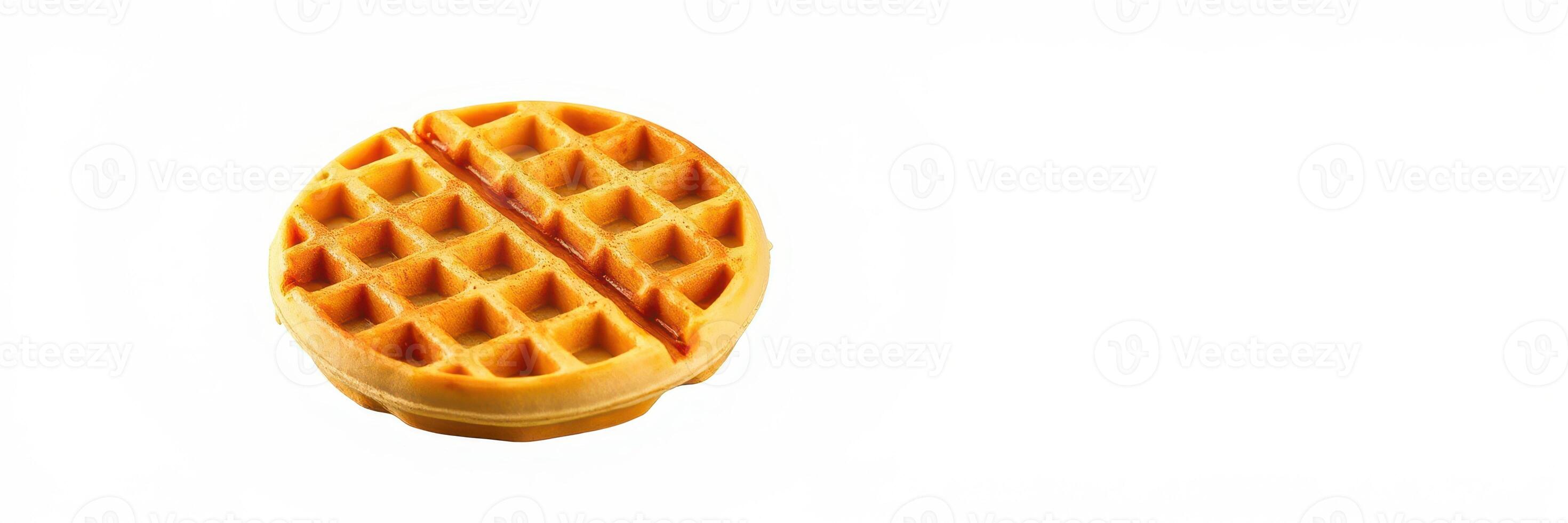 Waffle topped with syrup resting on a simple white background ready to be enjoyed in the morning photo