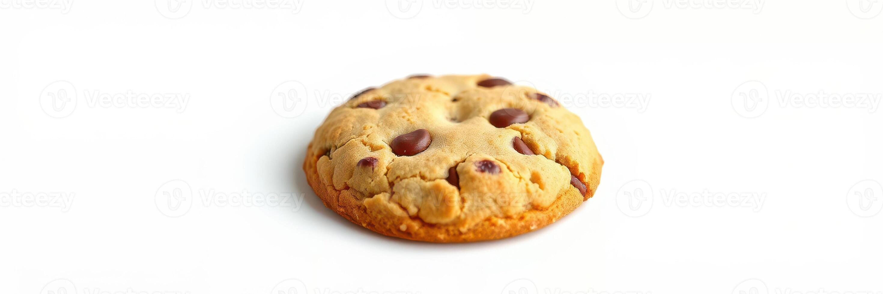 Freshly baked chocolate chip cookie on a white surface showcasing texture and color contrast photo