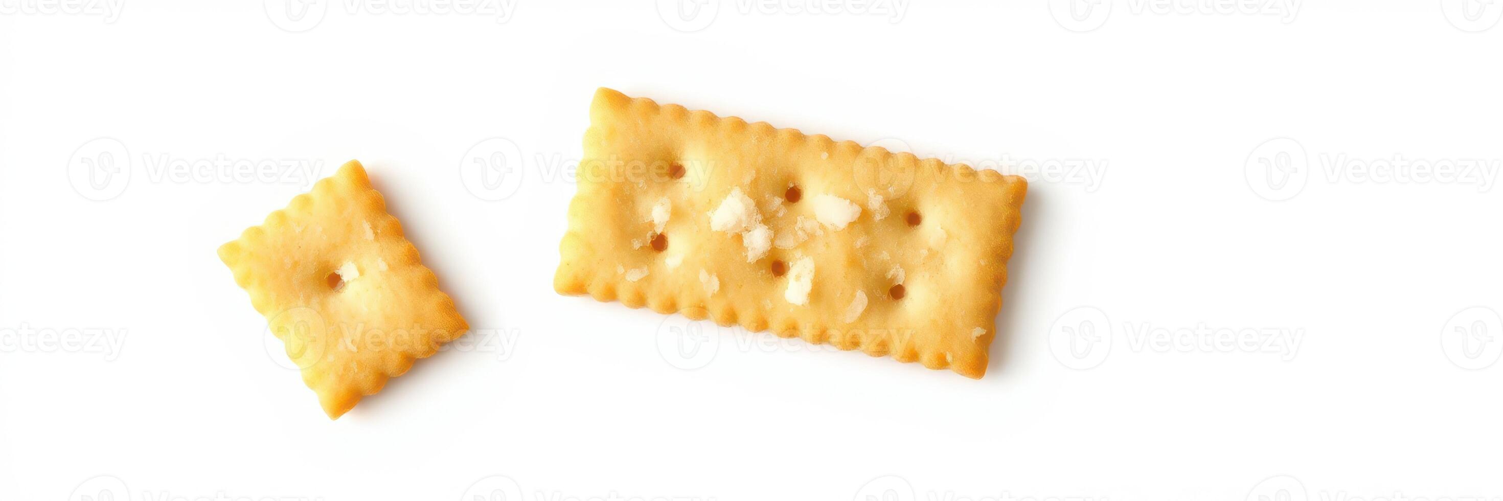 Different sizes of baked crackers displayed on a plain background emphasize snack options photo