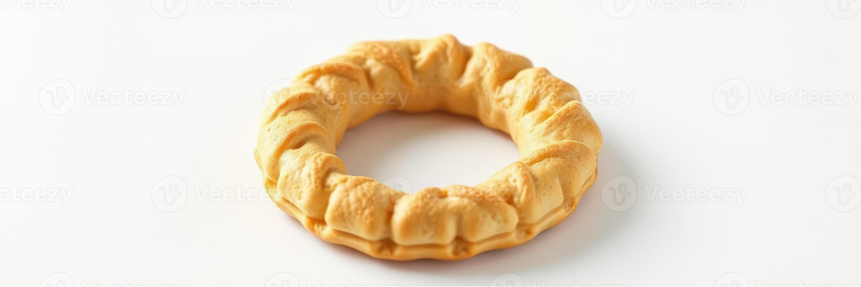 Unique round pastry with a textured surface showcased on a plain background ideal for culinary presentation photo