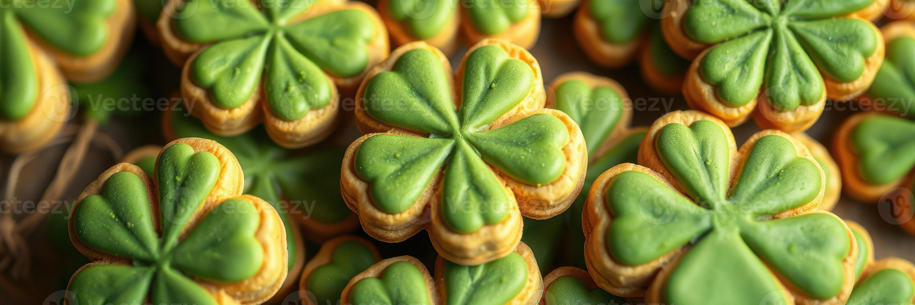 Colorful shamrock cookies arranged on a table for Saint Patrick's Day celebration or festive gathering photo