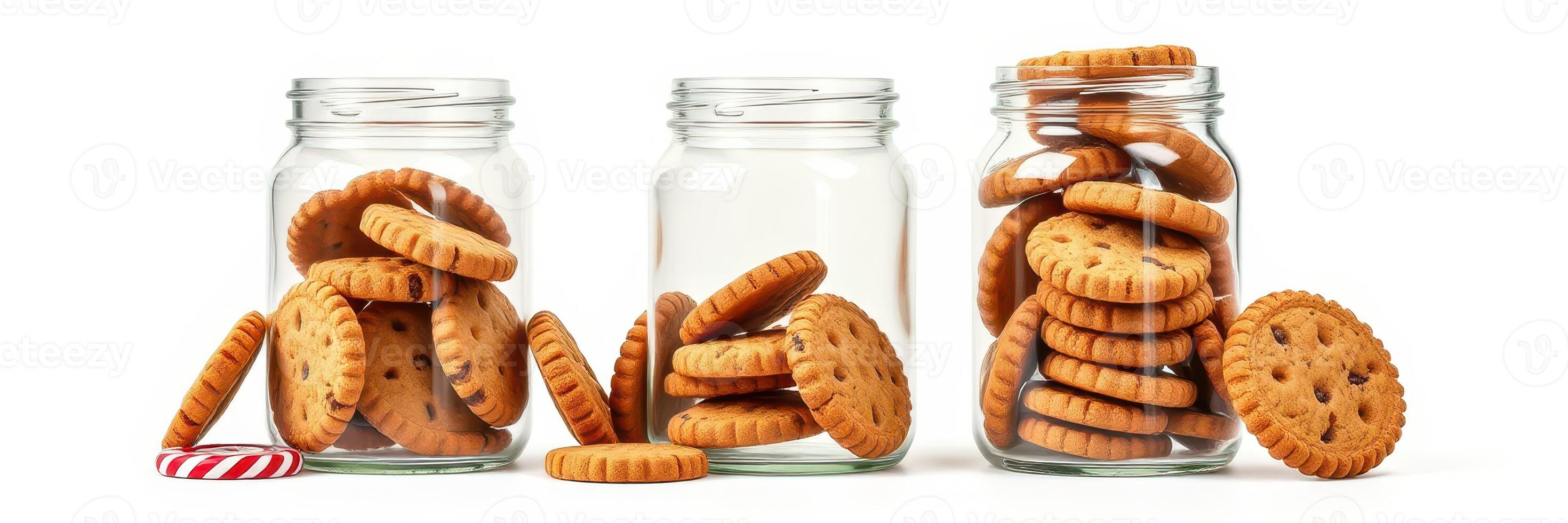 Assorted homemade cookies displayed in glass jars on a white background inviting for a sweet treat photo
