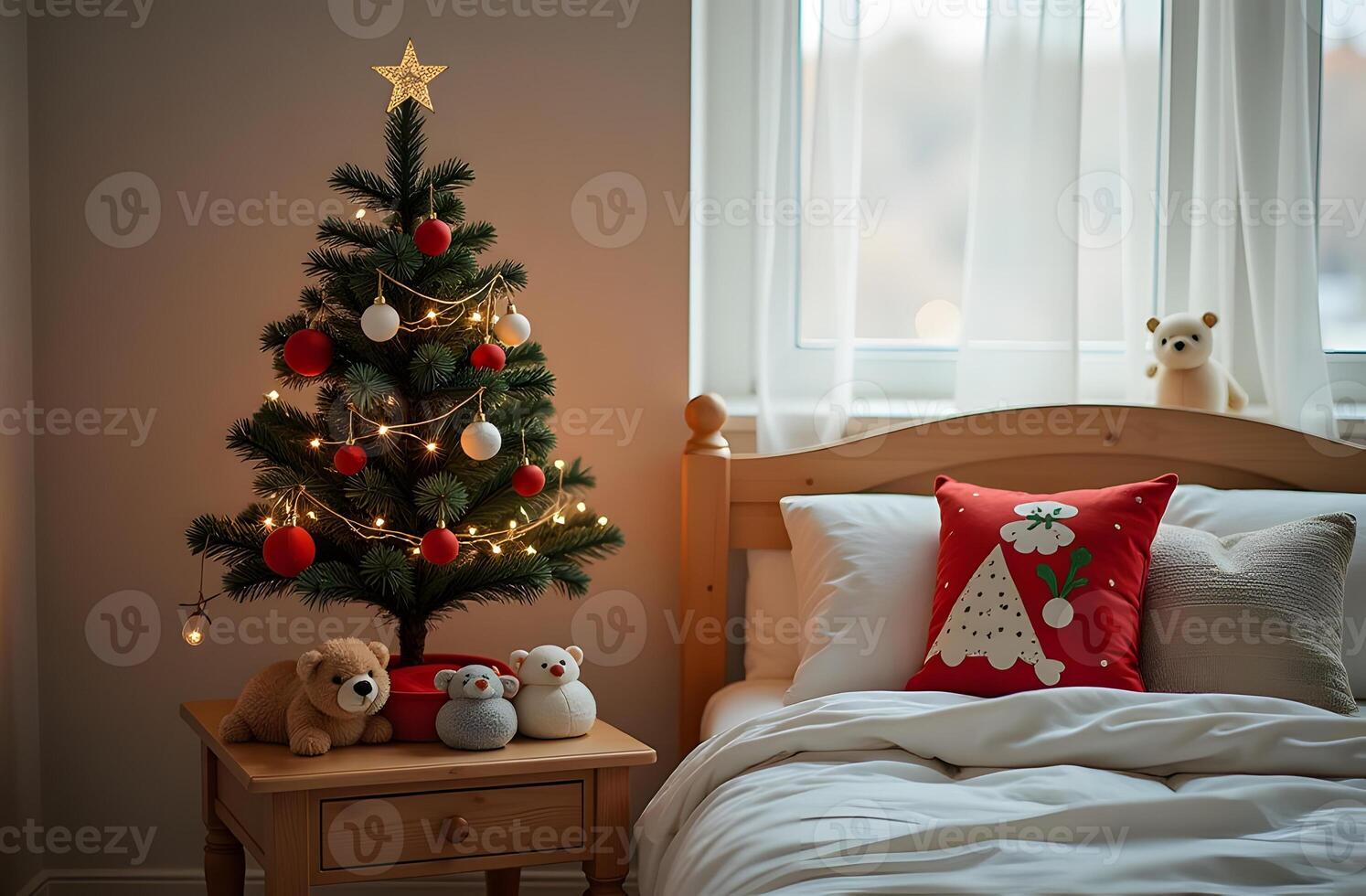 The cozy ambiance of a childs room is highlighted by a tiny Christmas tree on a little table photo