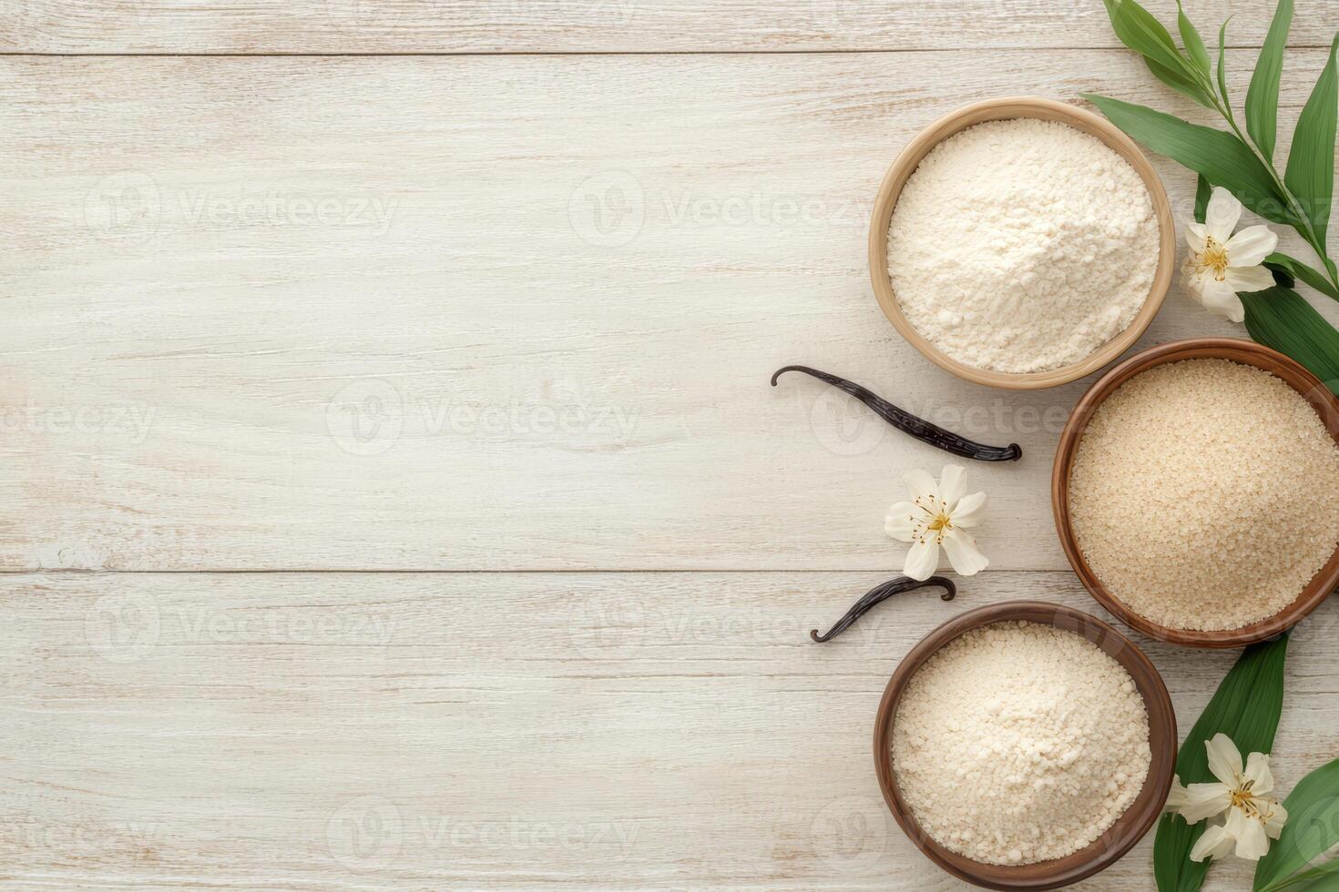 Vanilla Beans and Baking Ingredients on Rustic Wooden Surface photo