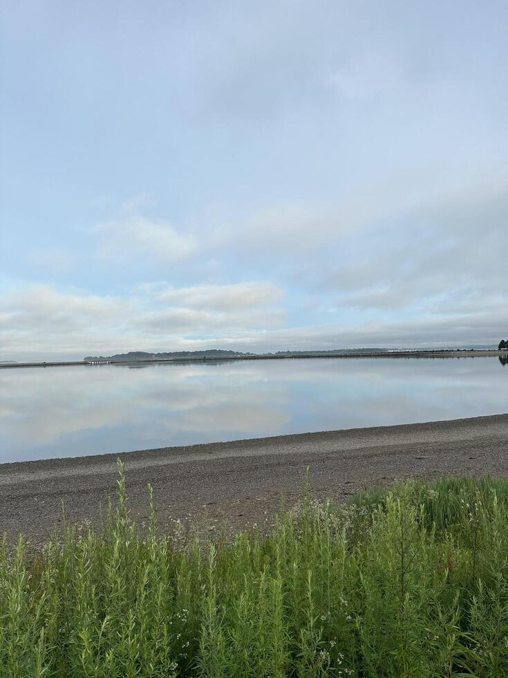 Cloudy Reflection on Water photo
