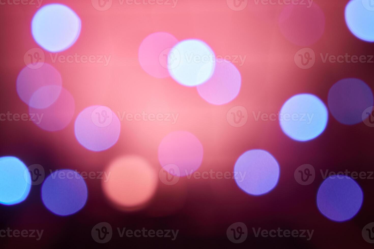 Colorful bokeh on a black background, bokeh abstract background, modern abstract backdrop. Christmas background, Xmas backdrop. Halloween scary concept, Halloween bokeh background photo