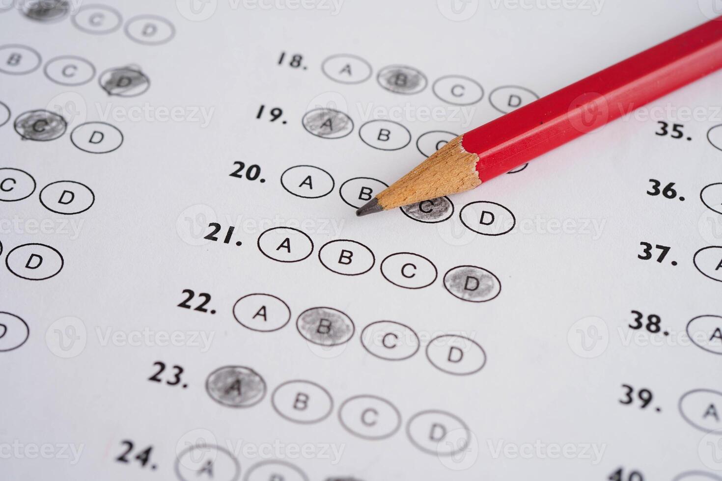 Answer sheets with pencil drawing fill to select choice, education concept. photo