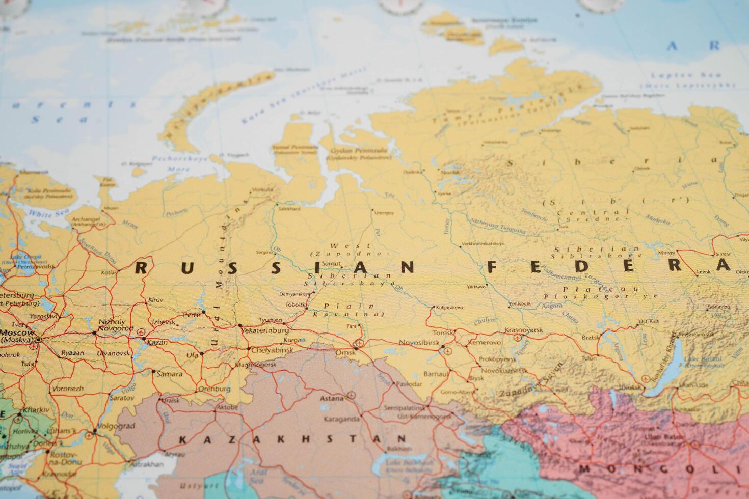 Bangkok, Thailand December 10, 2023 Russian map in world map paper. photo