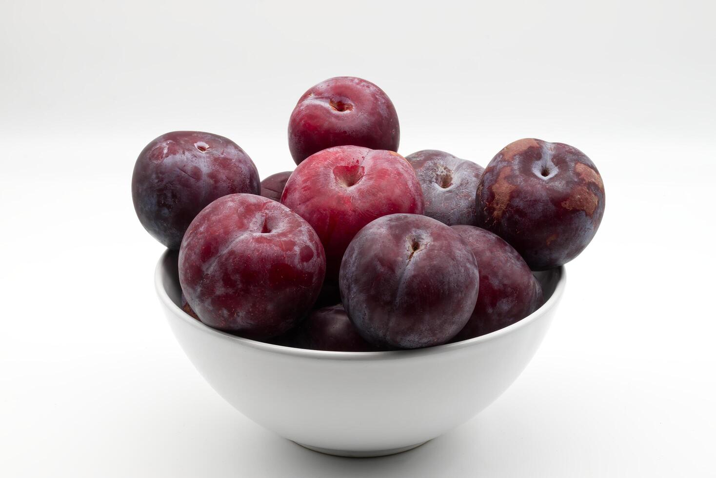 Fresh Plums in a White Bowl, photo