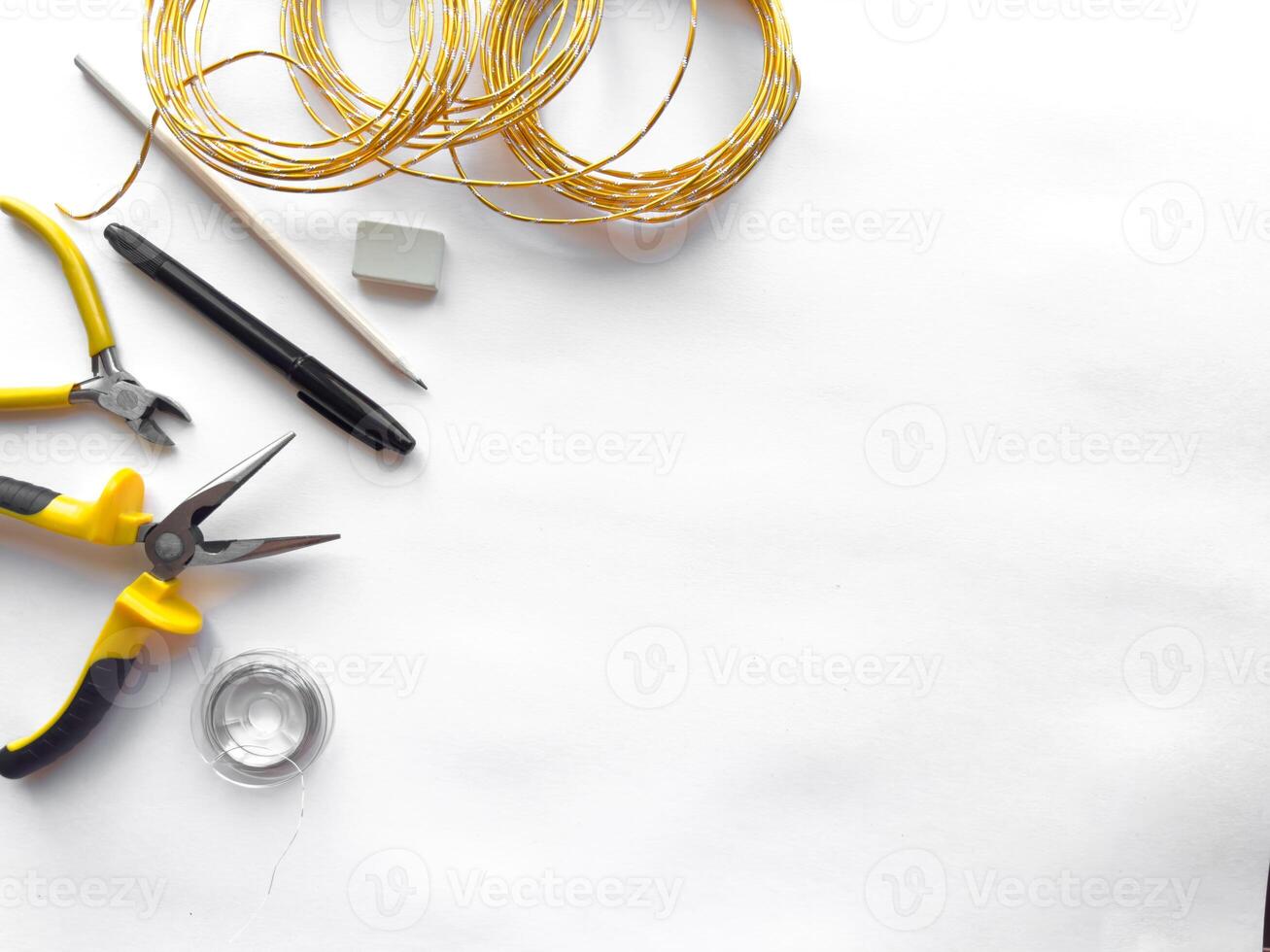 Crafting tools and materials on white background photo