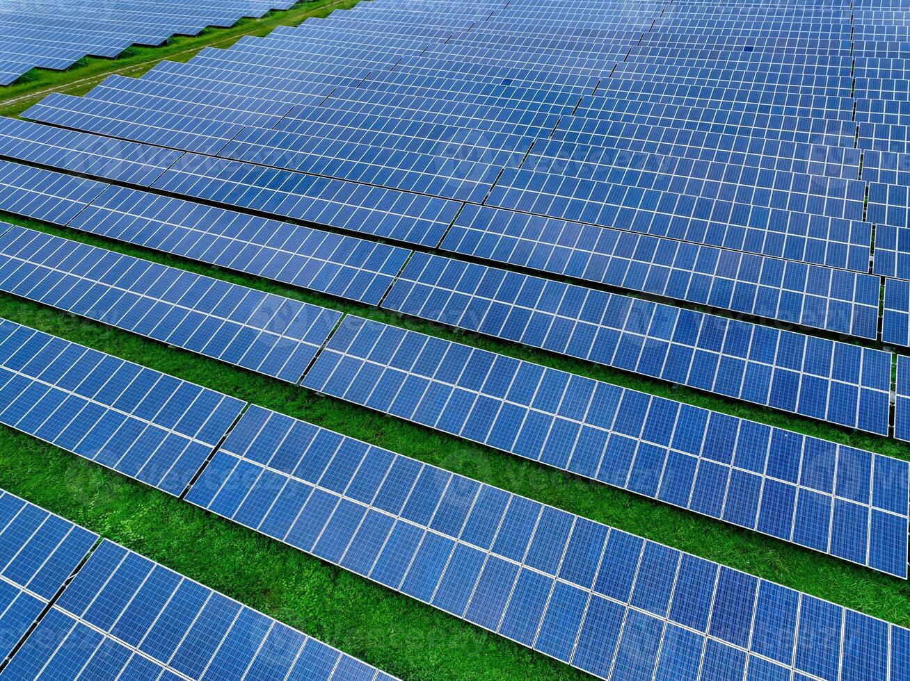 Aerial view of solar farm. Sustainable renewable energy and modern photovoltaic technology for eco-friendly electricity production. Solar power station. Green energy solutions. Solar panel technology. photo