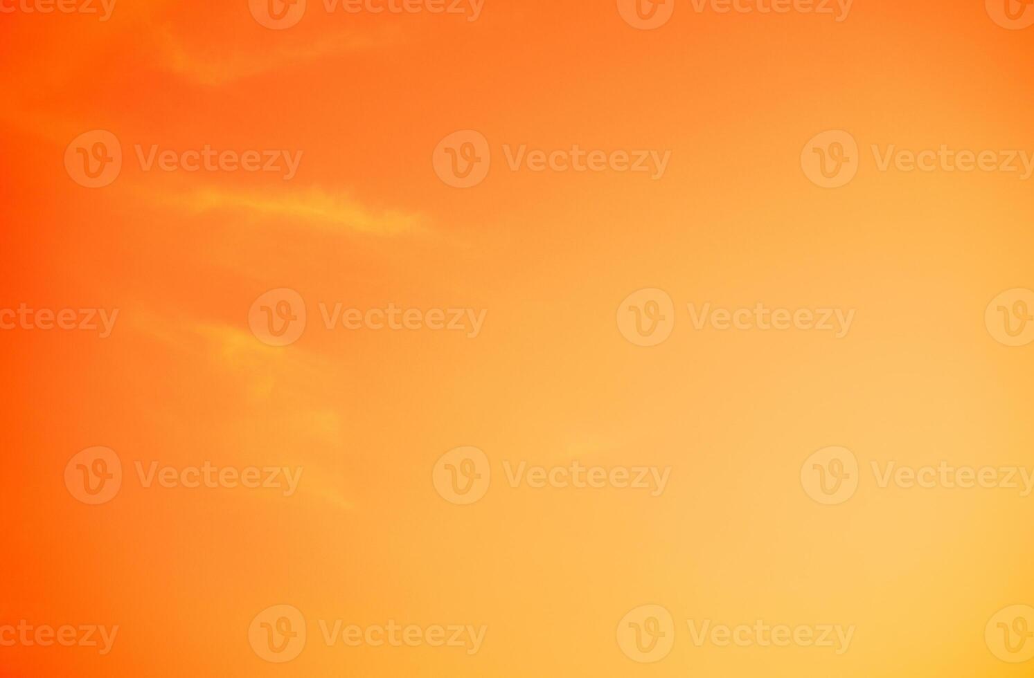 Vibrant orange sunset sky creating a serene and tranquil atmosphere, ideal for climate and environmental concepts or as an emotional and psychological design background, evoking warmth and creativity. photo