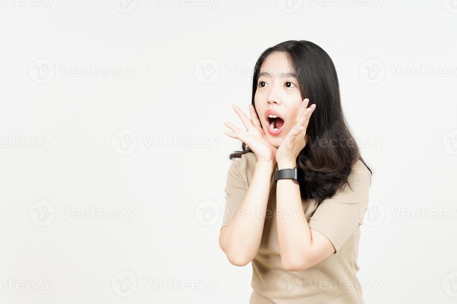 Shouting out loud with hands over mouth Of Beautiful Asian Woman Isolated On White Background photo