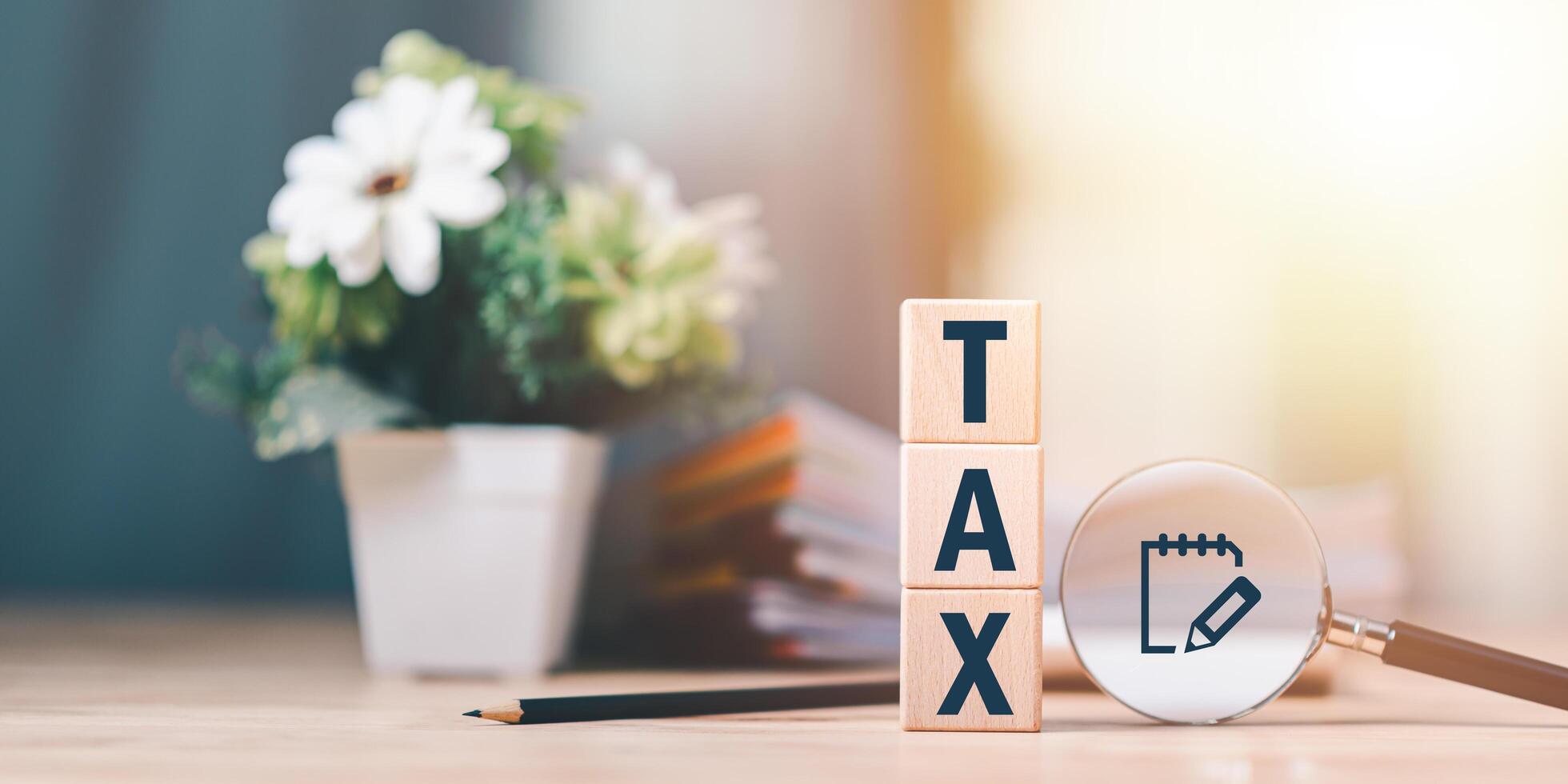 Annual tax deduction planning concept ,Calculate business balance to reduce taxes ,Calculation of individual tax rates, and business financial budget ,Examination and review of financial documents photo