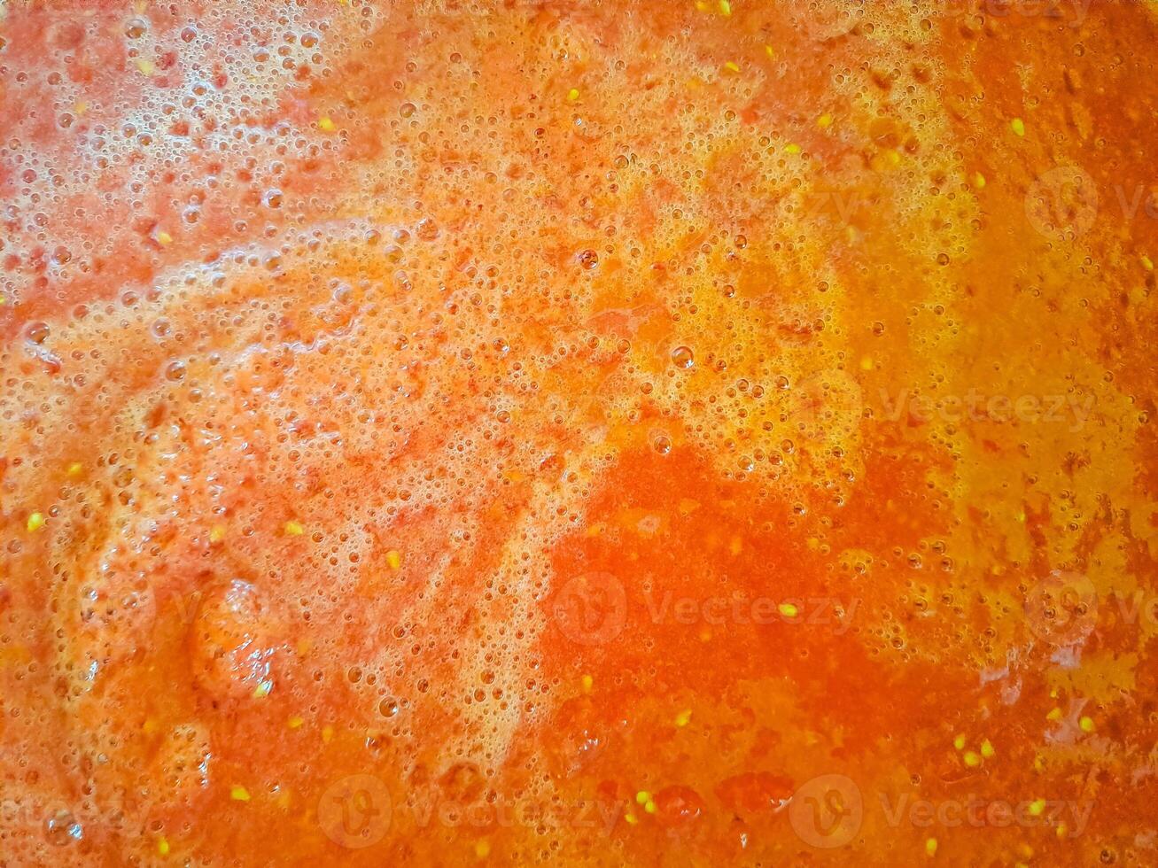 Tomato sauce texture background, closeup.Vegetable tomato drink for healthy diet photo