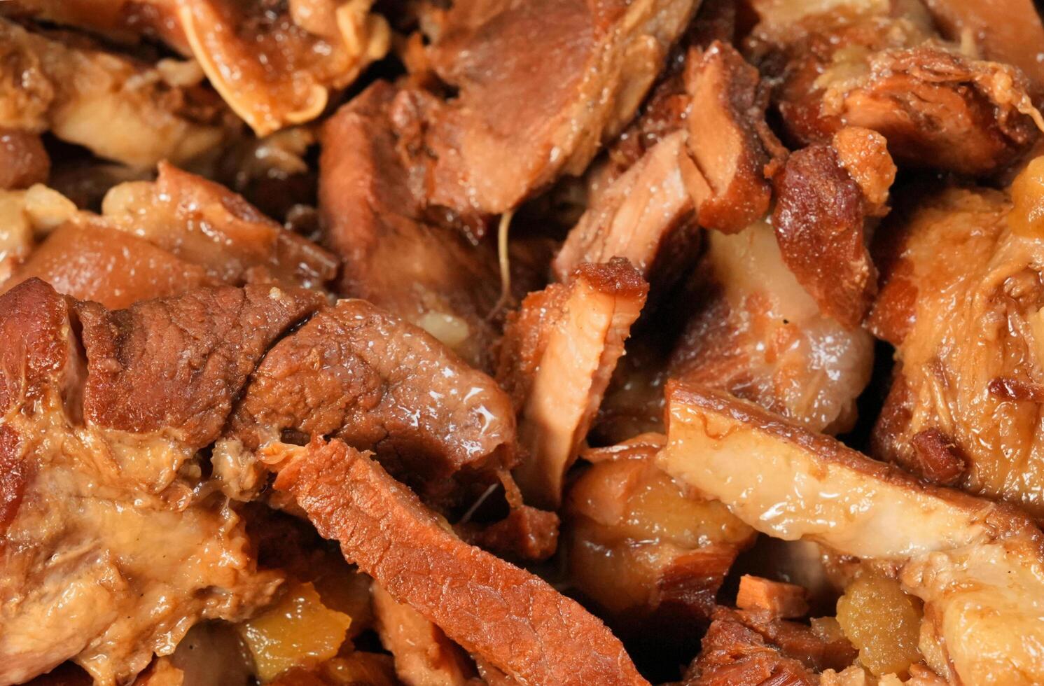a close up of a pile of meat on a plate photo