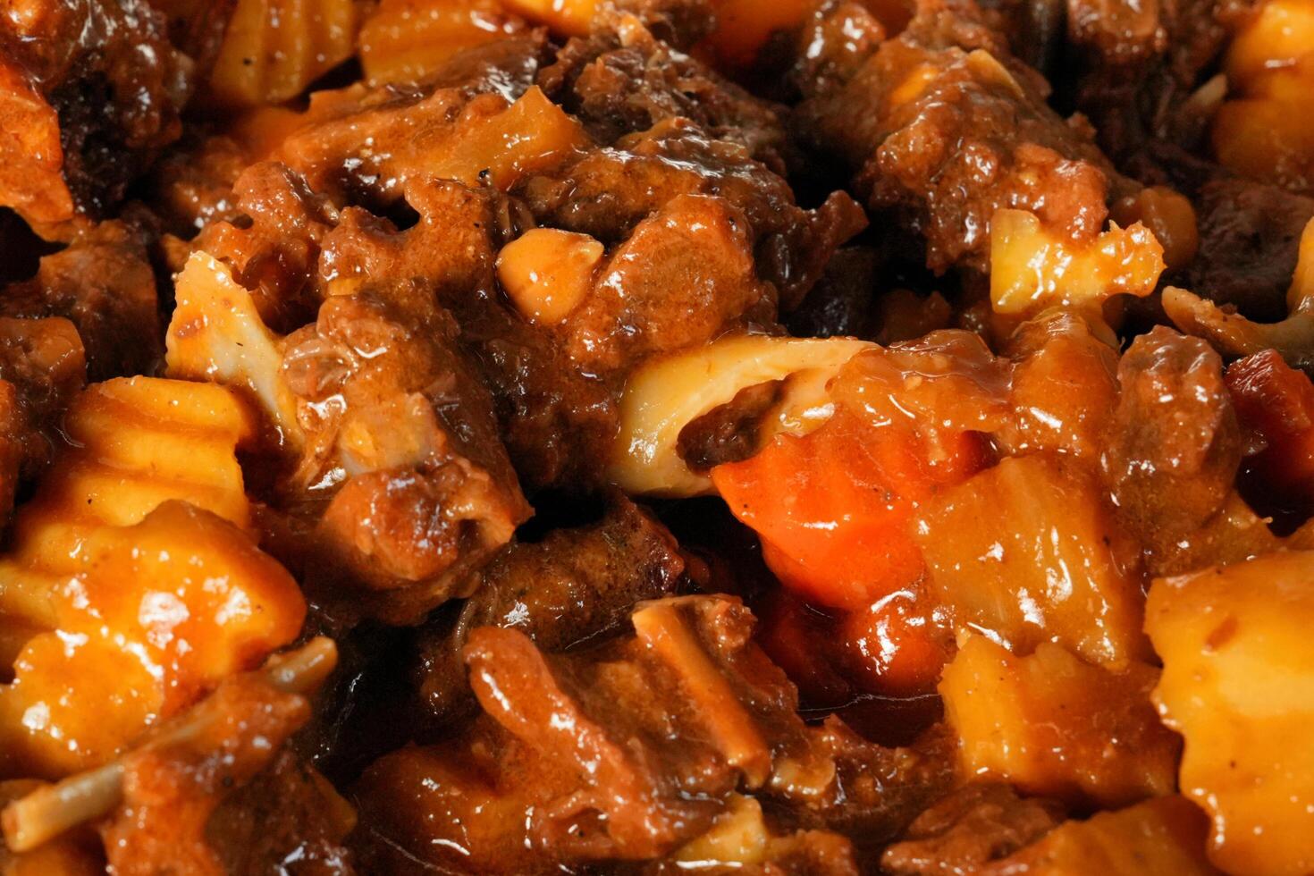 a close up of a dish of meat and vegetables photo