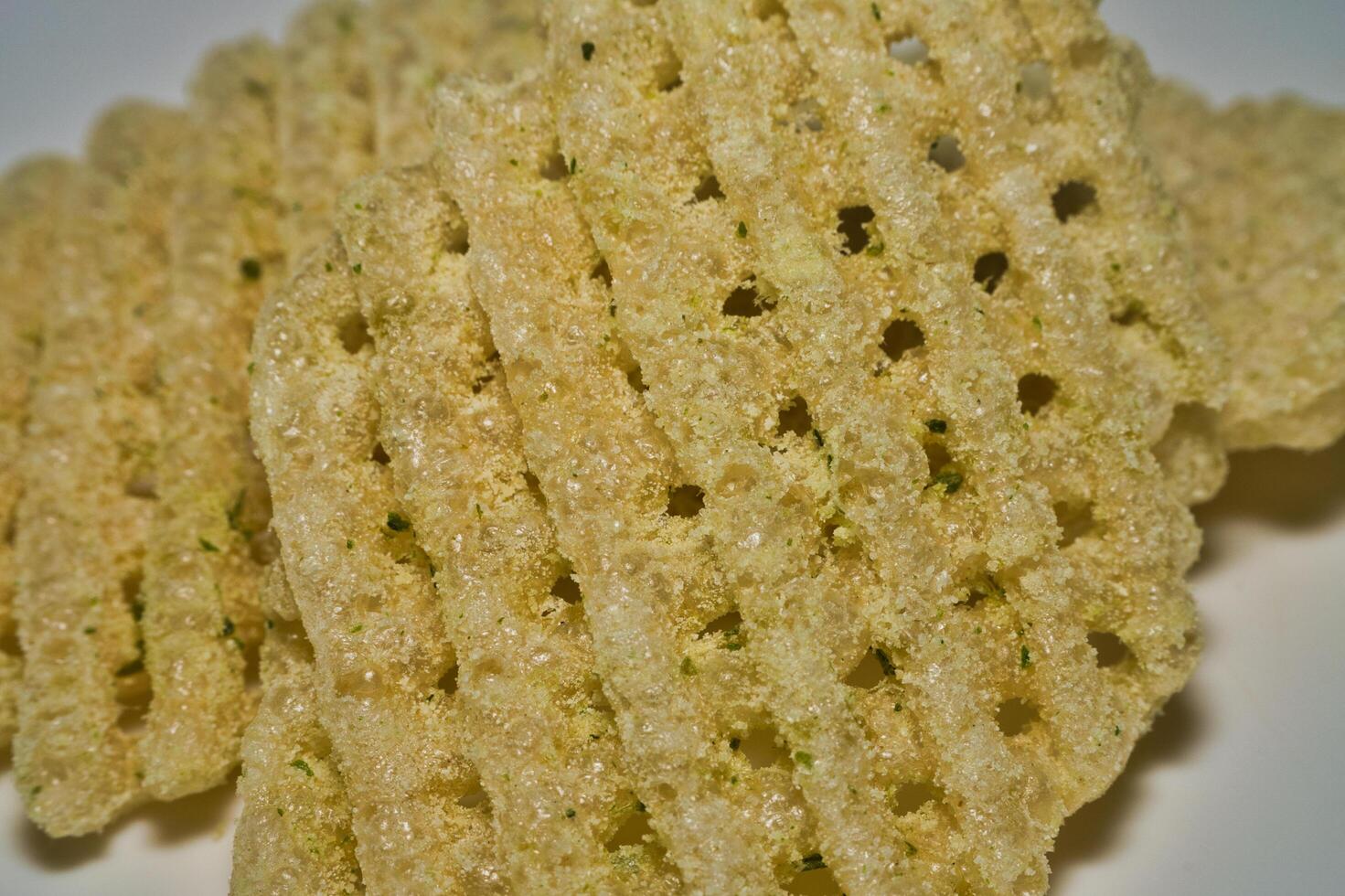 chips made from wheat and potatoes and are on a white plate photo