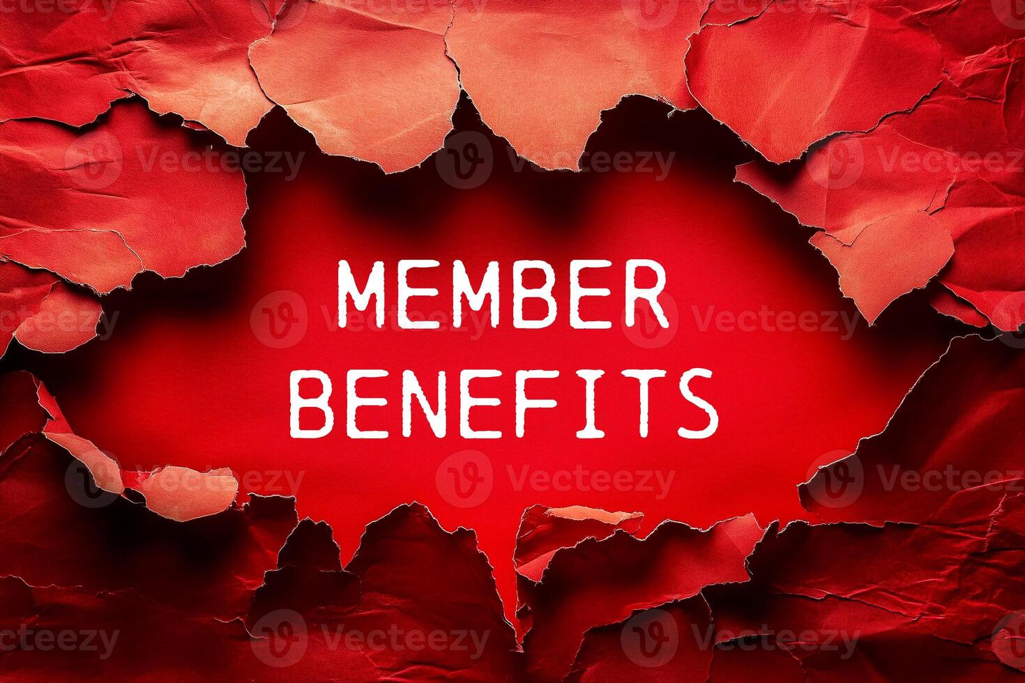 Member benefits message written on ripped red torn paper. Conceptual member benefits symbol. photo