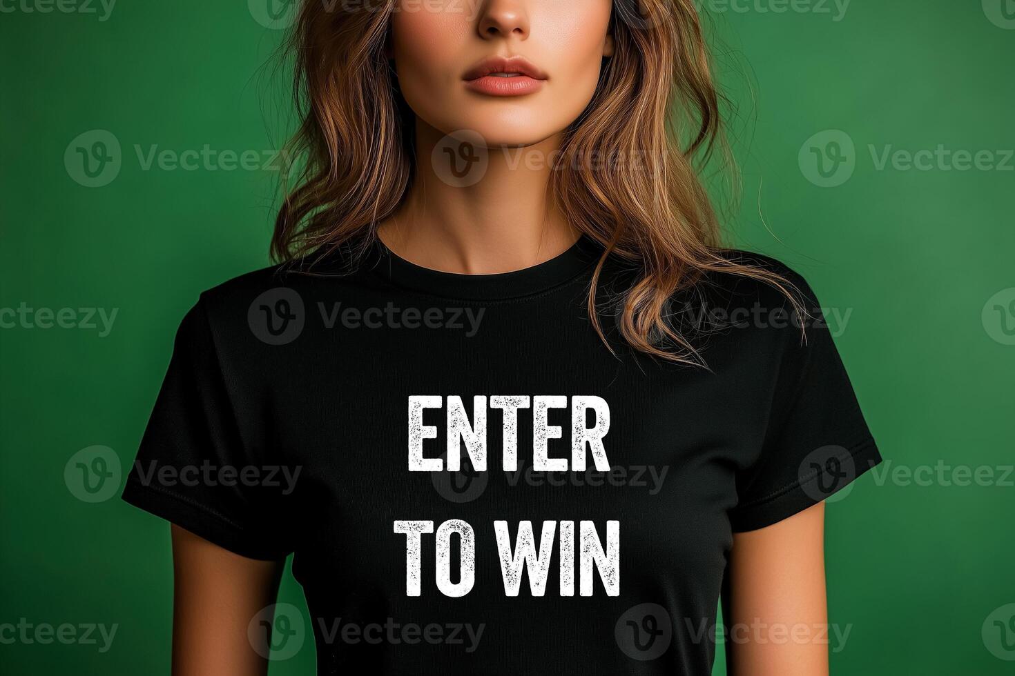Enter to win message written on black t-shirt on young woman. Conceptual enter to win symbol. photo