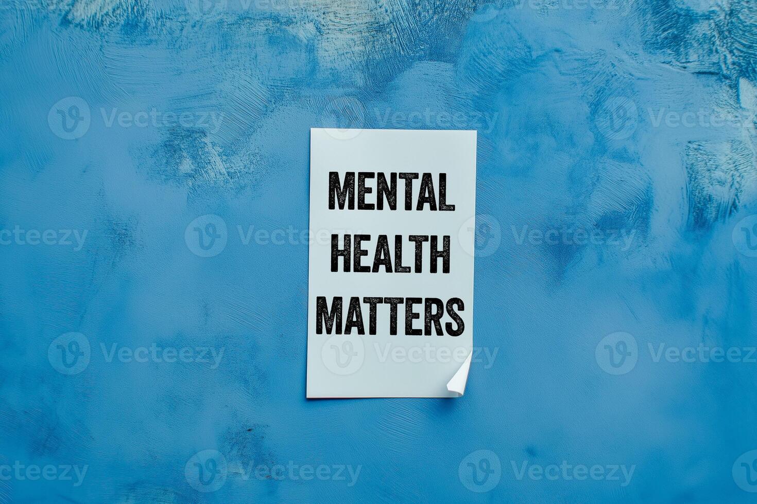 Mental health matters message written on white paper on blue background. Conceptual mental health matters symbol. Copy space. photo