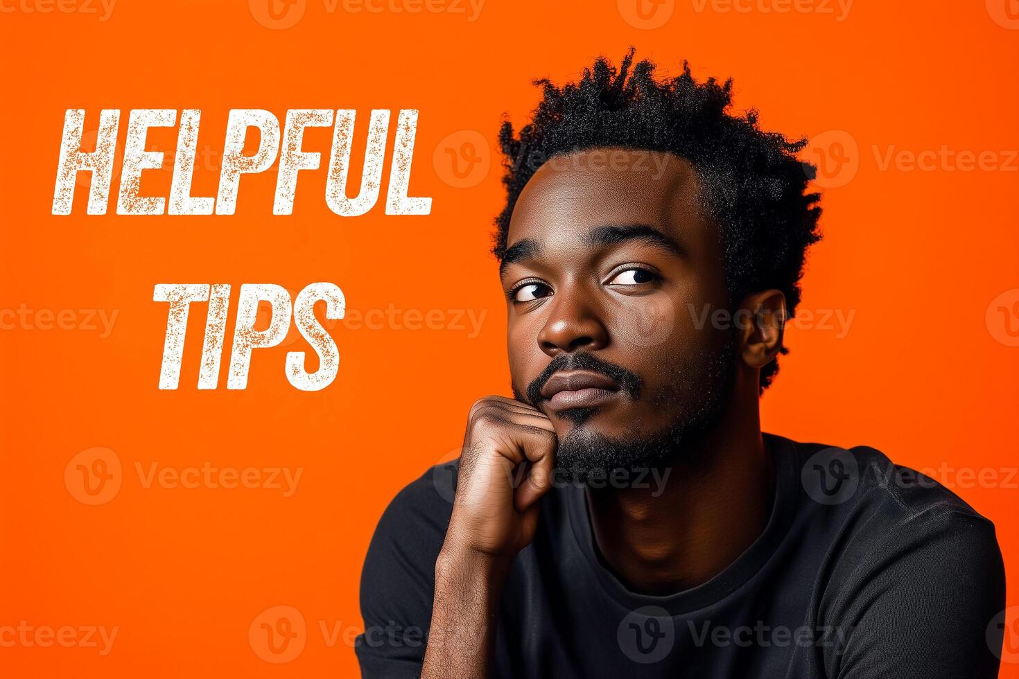 Helpful tips message with a young man on orange background. Conceptual helpful tips symbol. photo