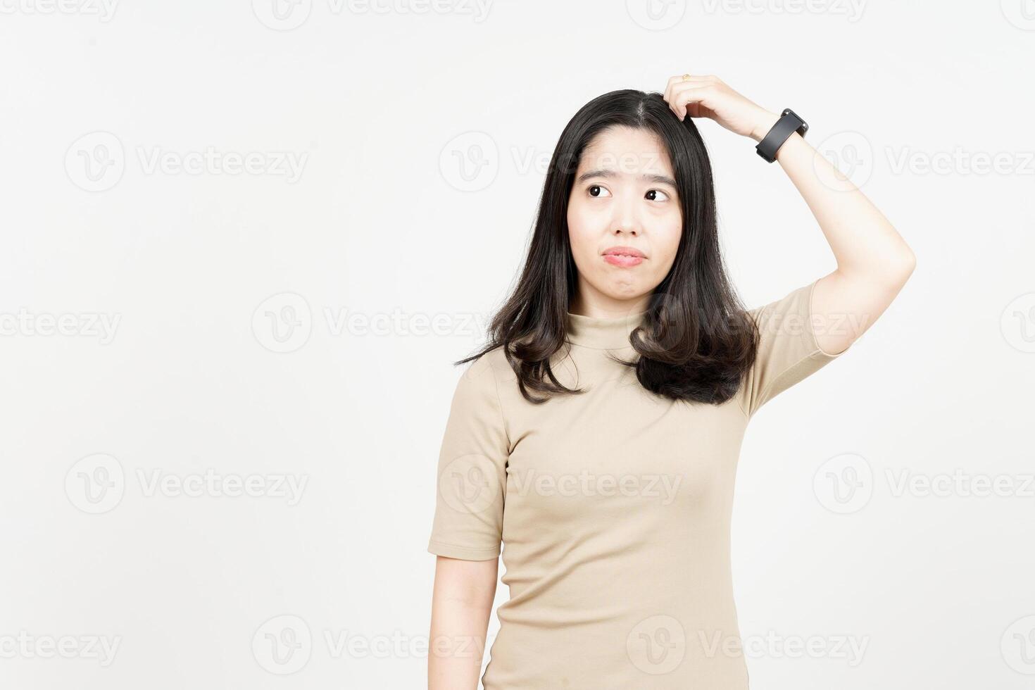 Confused Gesture Of Beautiful Asian Woman Isolated On White Background photo