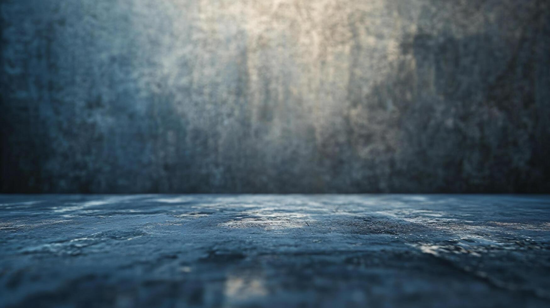 Blue wall with a grey floor. The wall is made of concrete and the floor is made of concrete photo