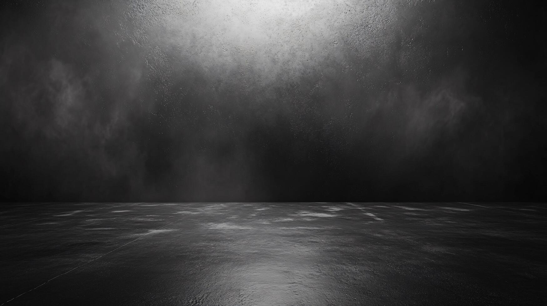 Black and white photo of a large empty space with a lot of dust and snow. Scene is dark and desolate