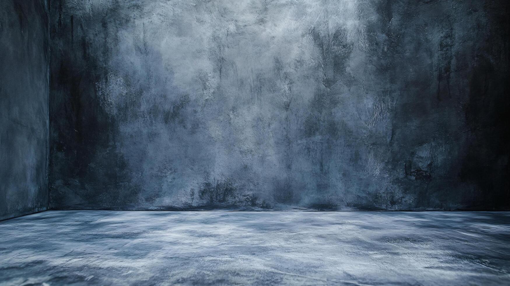 Large, empty room with a grey wall. The room is bare and empty, with no furniture or decorations. The grey wall gives the room a cold, sterile feel photo