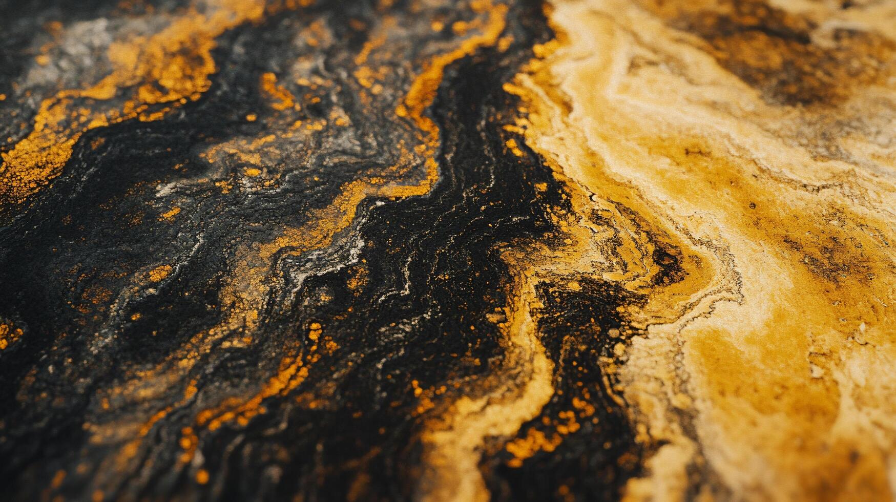 Close up of a black and gold swirl pattern. The colors are bold and the texture is rough. The image has a sense of depth and movement, as if the swirls are constantly shifting and changing photo