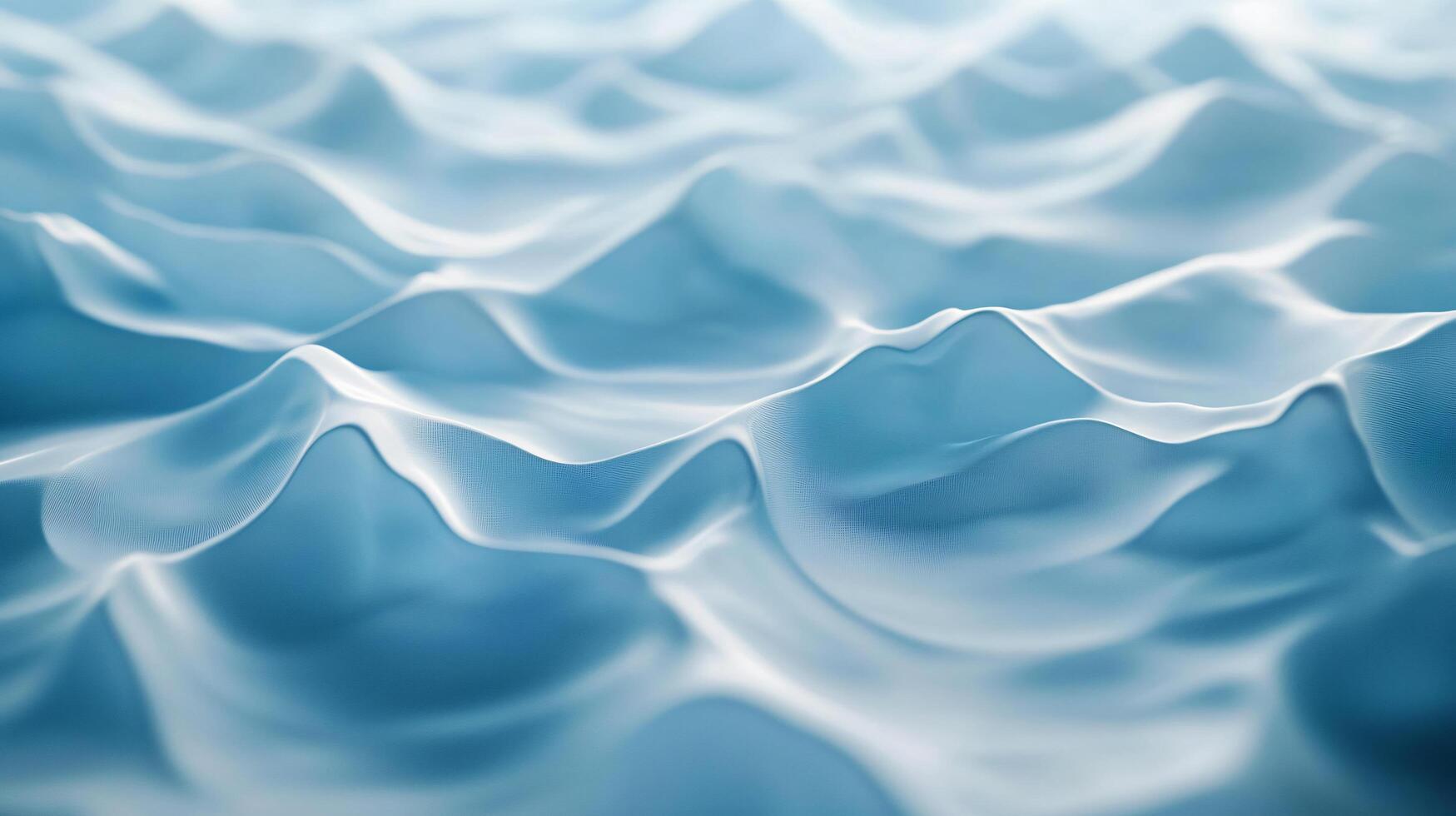 The image is of a blue ocean with waves and a mountain range in the background. The water appears to be calm and peaceful, with the waves gently rolling in photo