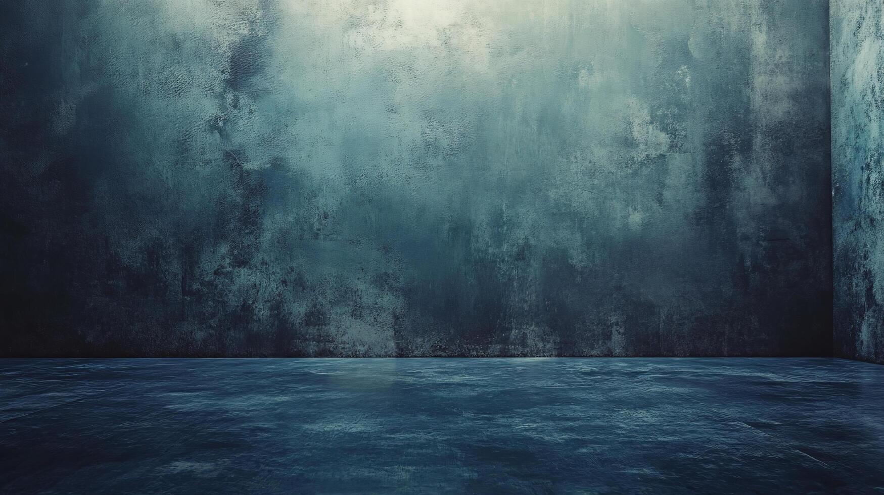 Large, empty room with a blue wall. The room is bare and empty, with no furniture or decorations. The blue wall gives the room a cold, sterile feel photo