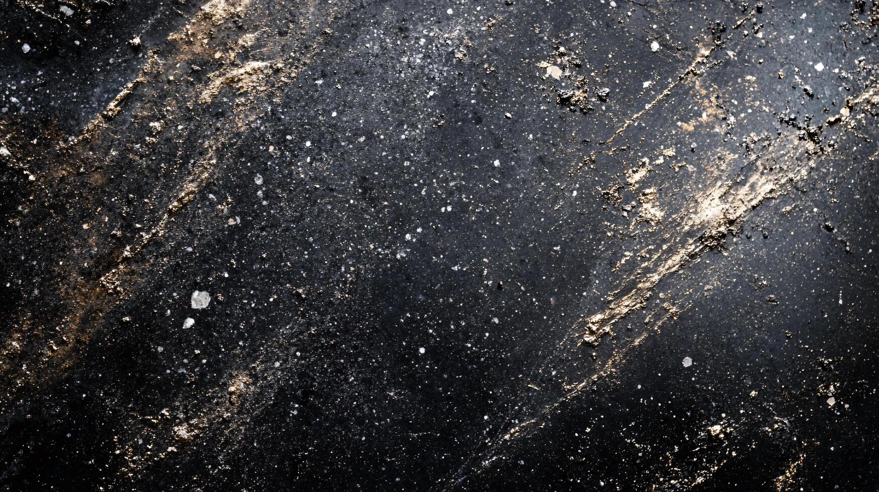 Black and gold background with a lot of stars. The stars are scattered all over the background photo