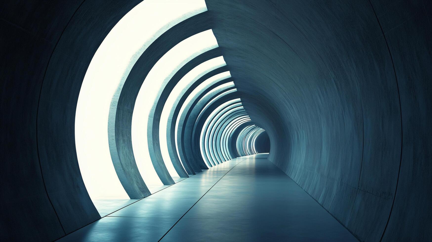 Long tunnel with a white light shining on it. The tunnel is dark and the light is the only source of illumination photo