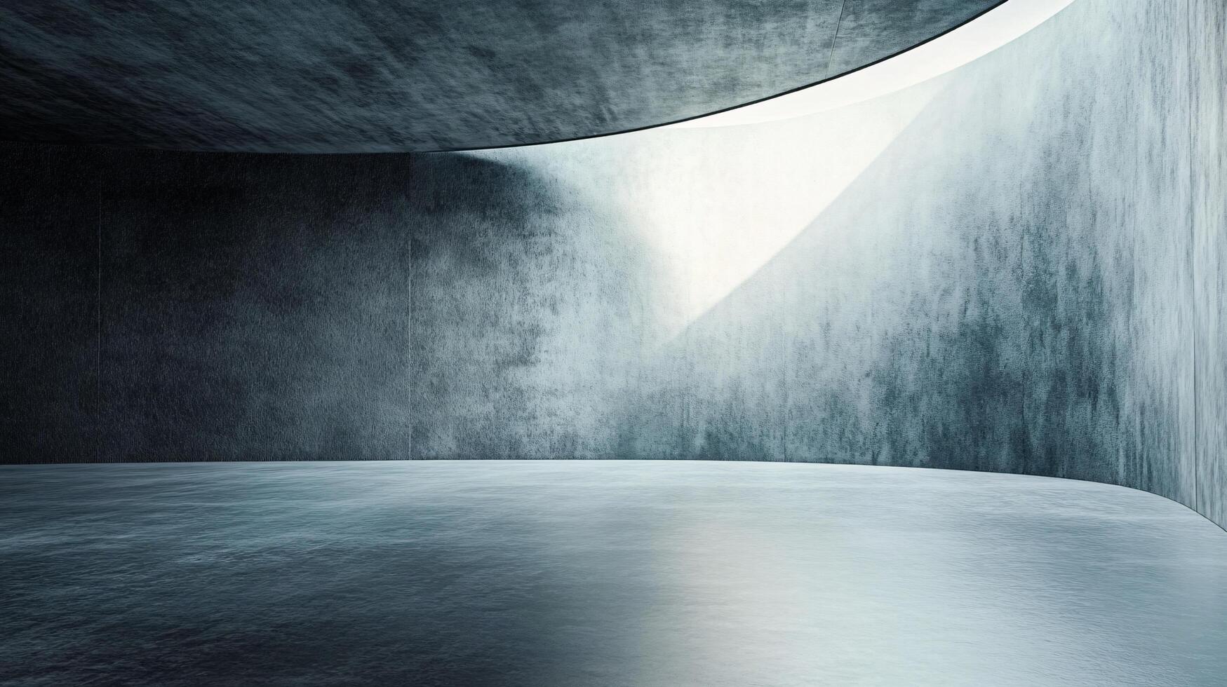 Large, empty room with a curved wall and a window. The room is made of concrete and has a very cold, industrial feel photo