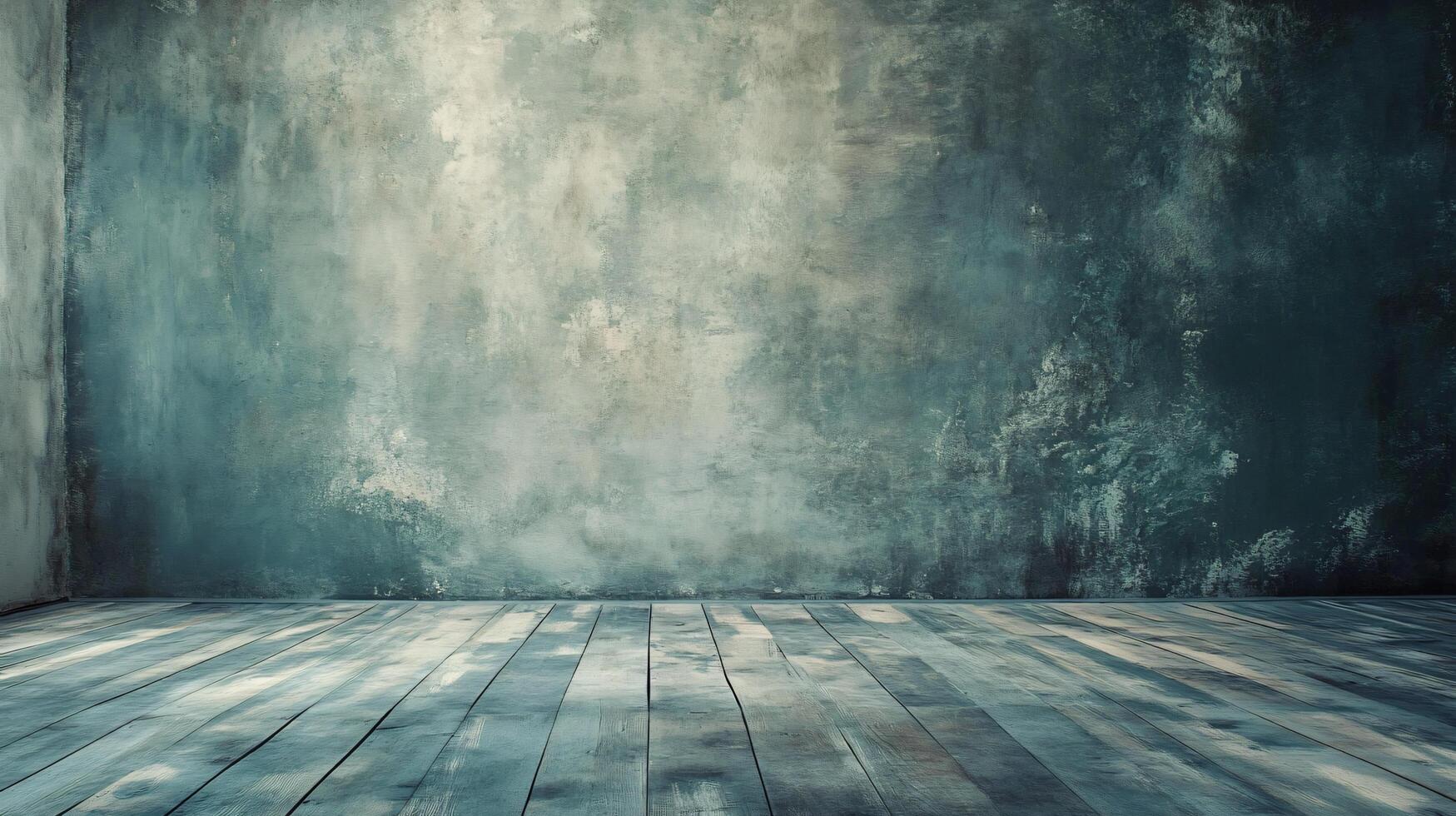 Large empty room with a blue wall and wooden floor. The room is bare and empty, with no furniture or decorations. The blue wall and wooden floor give the room a calm and peaceful atmosphere photo