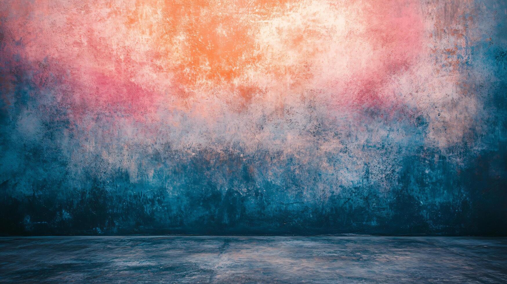 Wall with a blue background and orange and pink splatters. The splatters are in the shape of a cloud photo