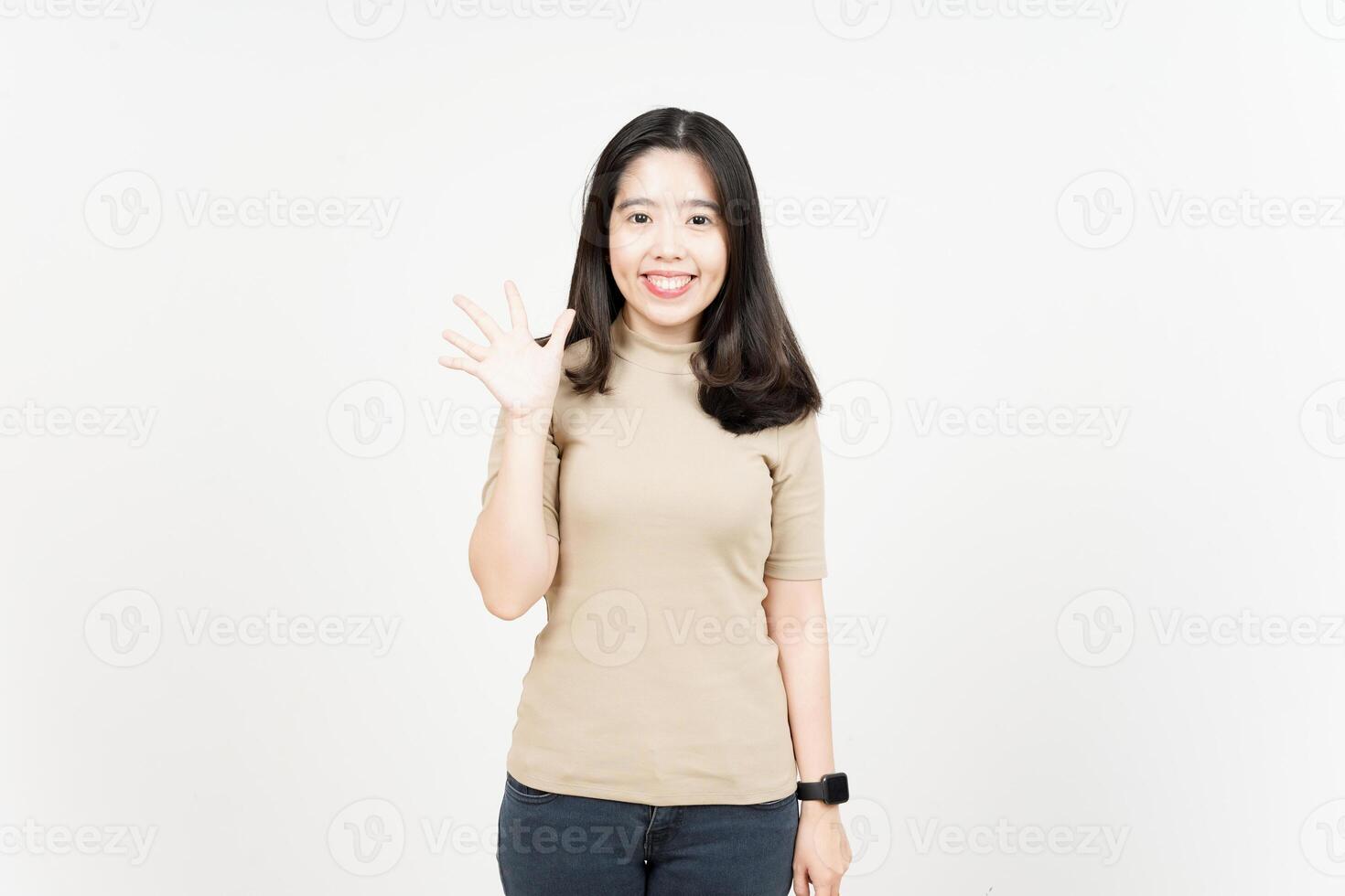 Hi Greeting or Waving at Camera Of Beautiful Asian Woman Isolated On White Background photo