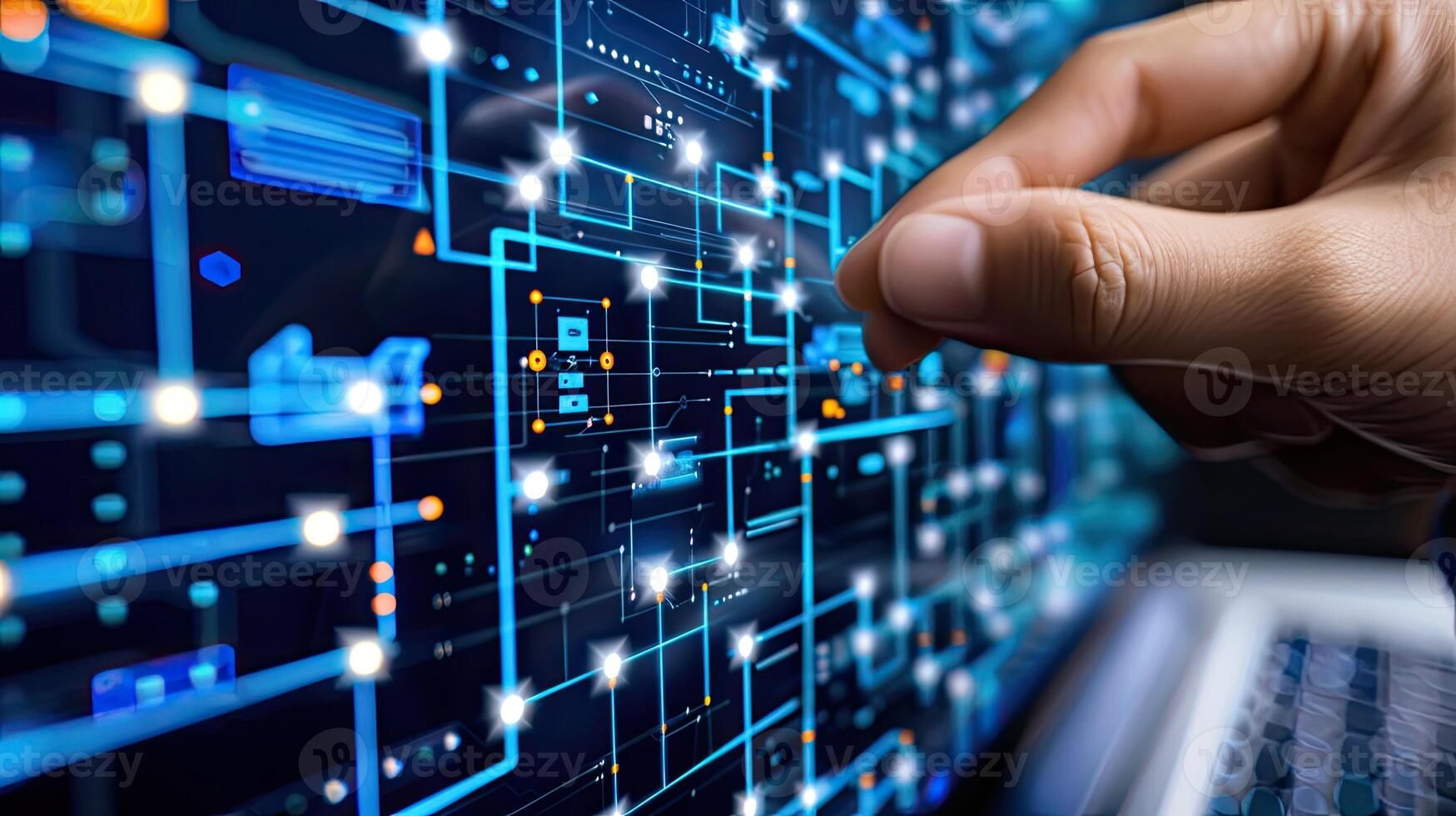 A person is pointing at a computer screen with a circuit board photo